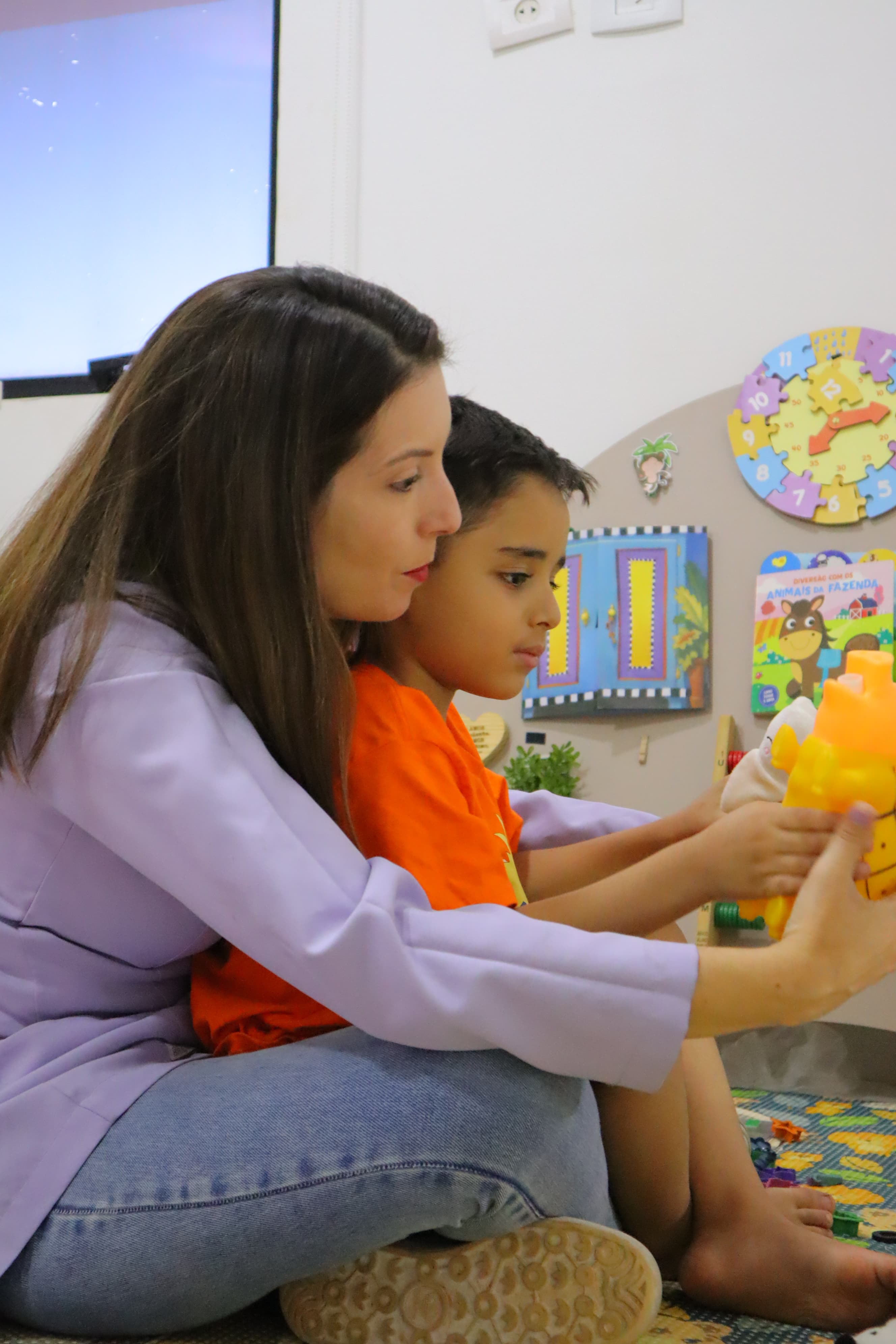 Avaliação fonoaudiológica em dinâmica com criança